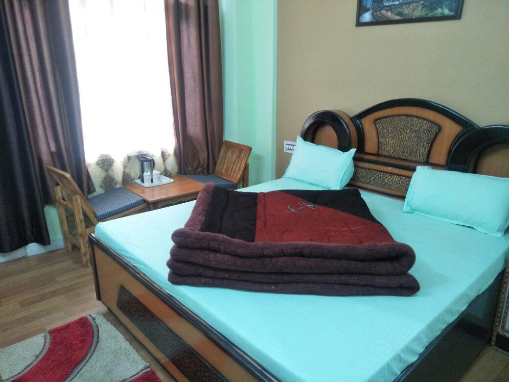 Hotel Mansarovar Banjār Esterno foto